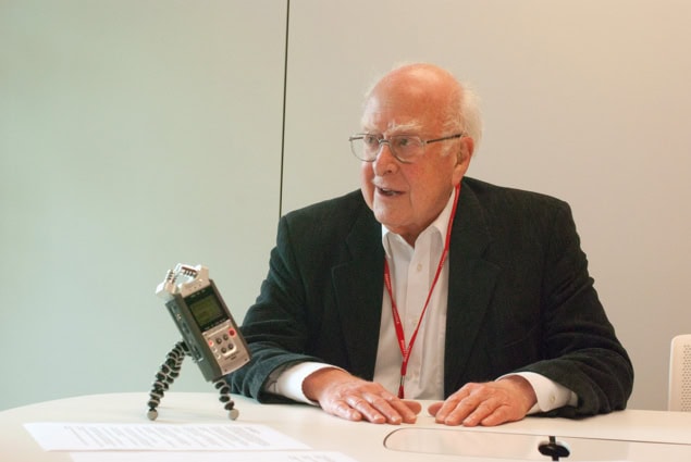 Peter Higgs with a microphone Peter Higgs with a microphone