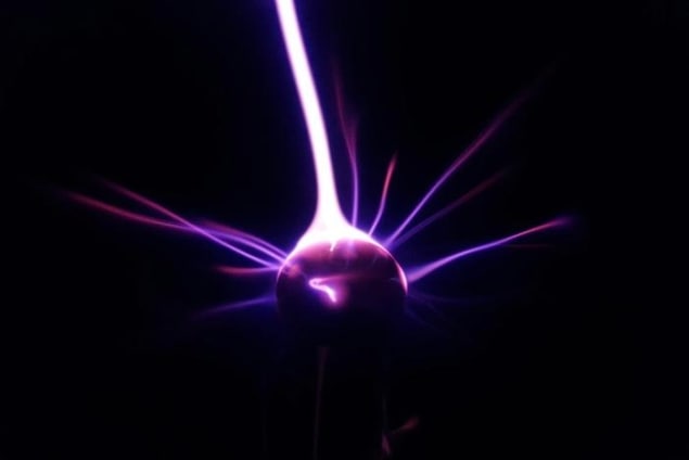 Quantum gravity experiment Artist's impression of the experiment, which resembles a glowing purple ball radiating purple spikes as if it were in motion