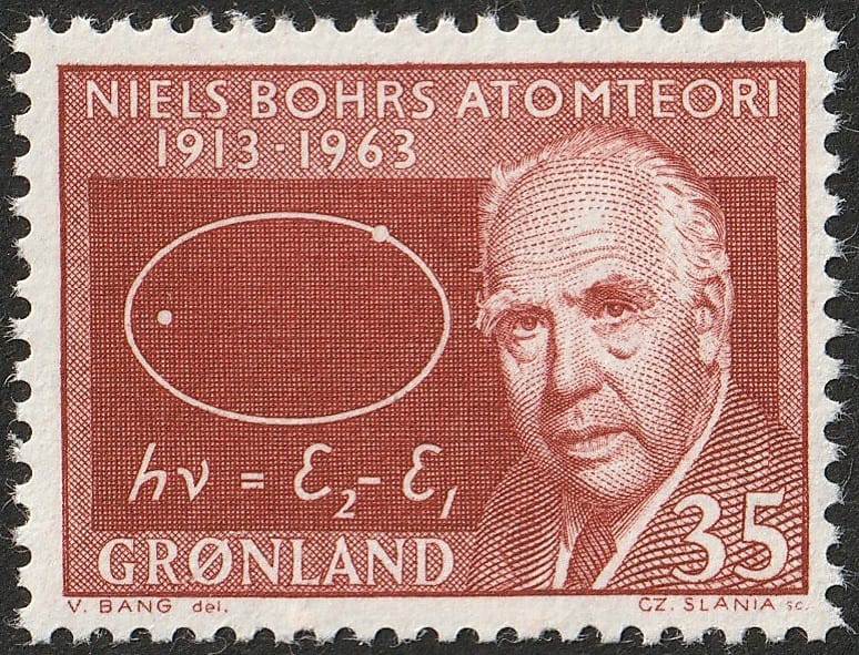1963 Greeland stamp showing a photo of Niels Bohr and an illustration of his electron model