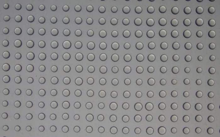 Microscope image of a 2D array of droplets created by ultrasound